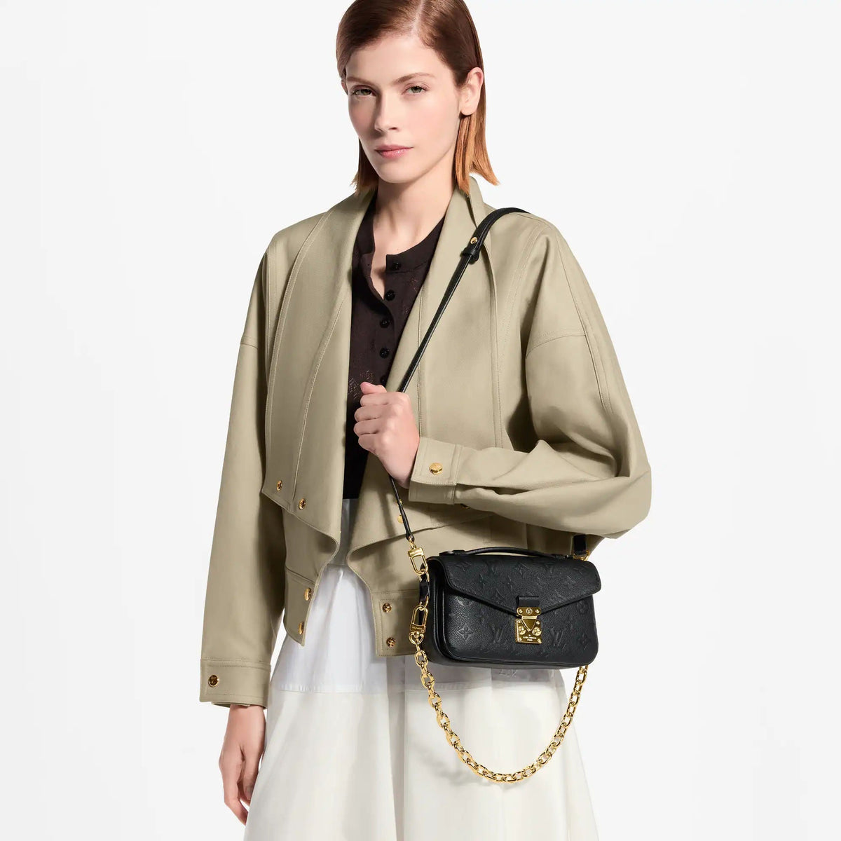 Pochette Métis East West Monogram Empreinte Leather Handbag M46595