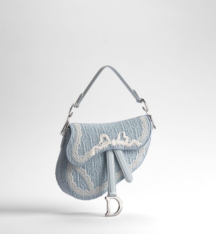 Small Saddle Luxury Handbag With Céleste Blue Oblique Embroidery And White Lace And Strap