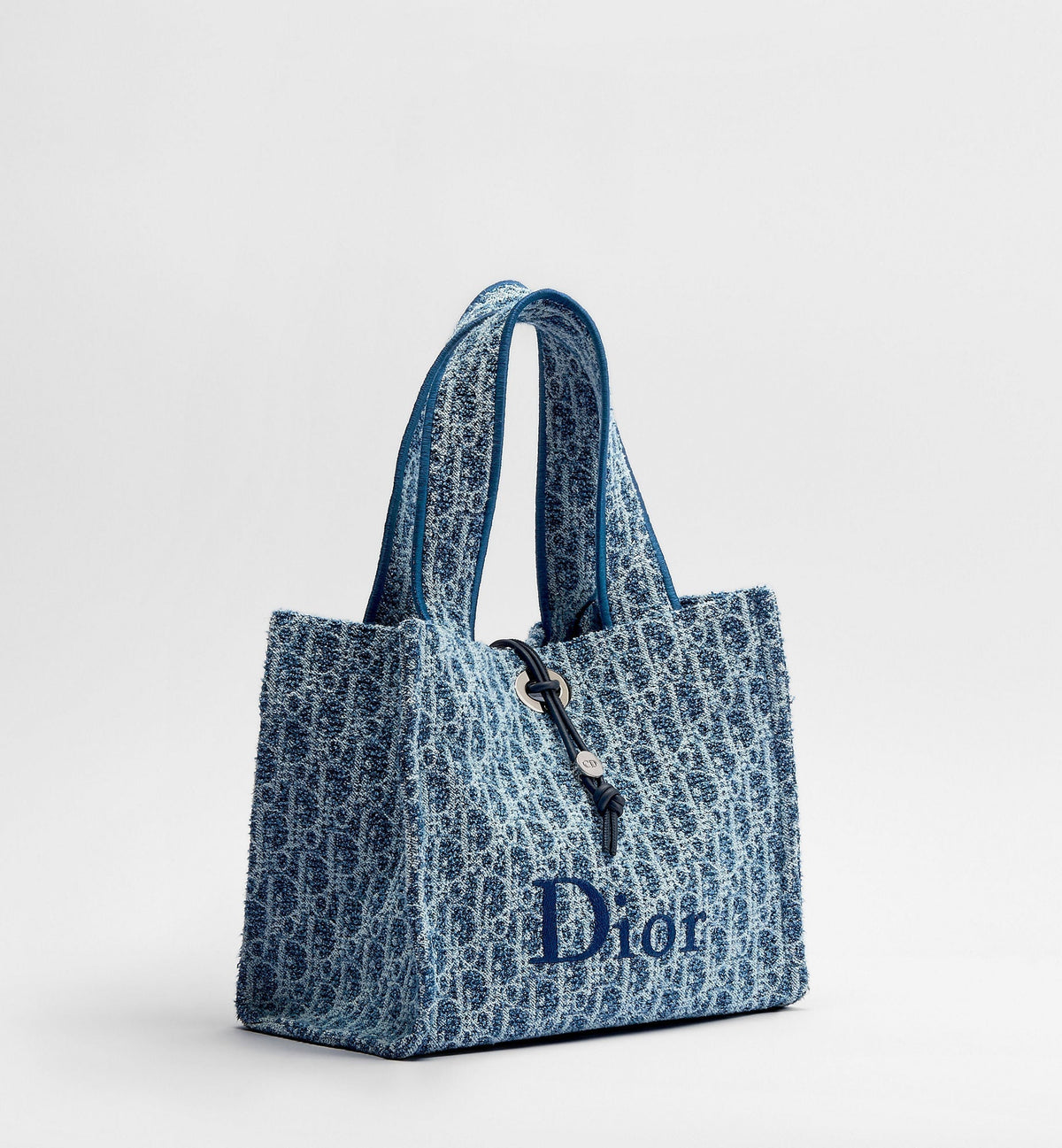 Small Spongy Book Designer Tote Bag With Blue Textured Fabric And Embroidered Signature