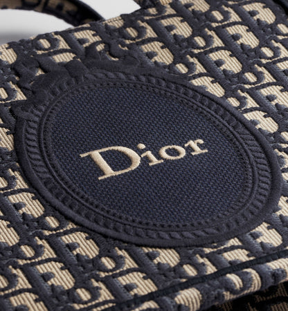 Small Book Designer Tote Bag with Blue Oblique Jacquard and Médaillon Signature