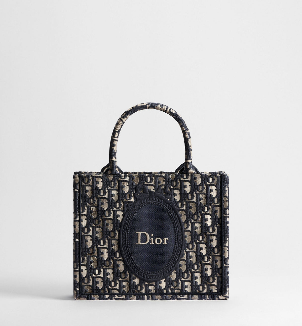 Small Book Designer Tote Bag with Blue Oblique Jacquard and Médaillon Signature