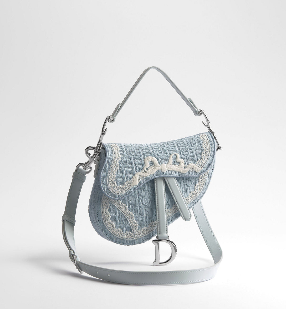 Small Saddle Luxury Handbag With Céleste Blue Oblique Embroidery And White Lace And Strap