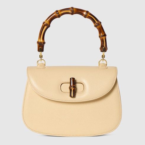 Small Top Handle Luxury Handbag With Soft Grainy Leather And Click Closure