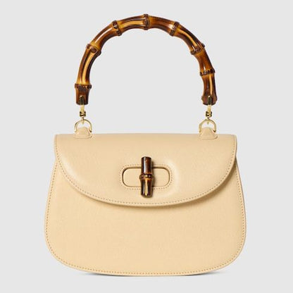 Small Top Handle Luxury Handbag With Soft Grainy Leather And Click Closure