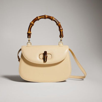 Small Top Handle Luxury Handbag With Soft Grainy Leather And Click Closure