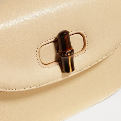 Small Top Handle Luxury Handbag With Soft Grainy Leather And Click Closure