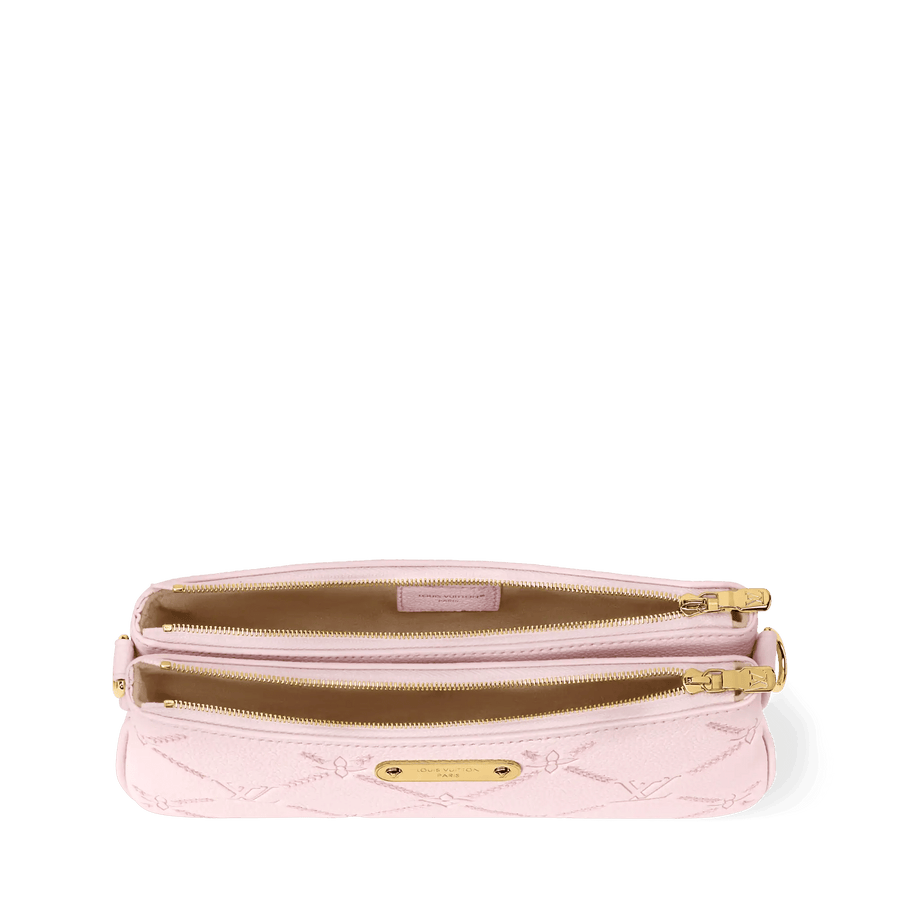 Pochette Liv Light Bliss Couture Monogram Empreinte Leather Bag M29495