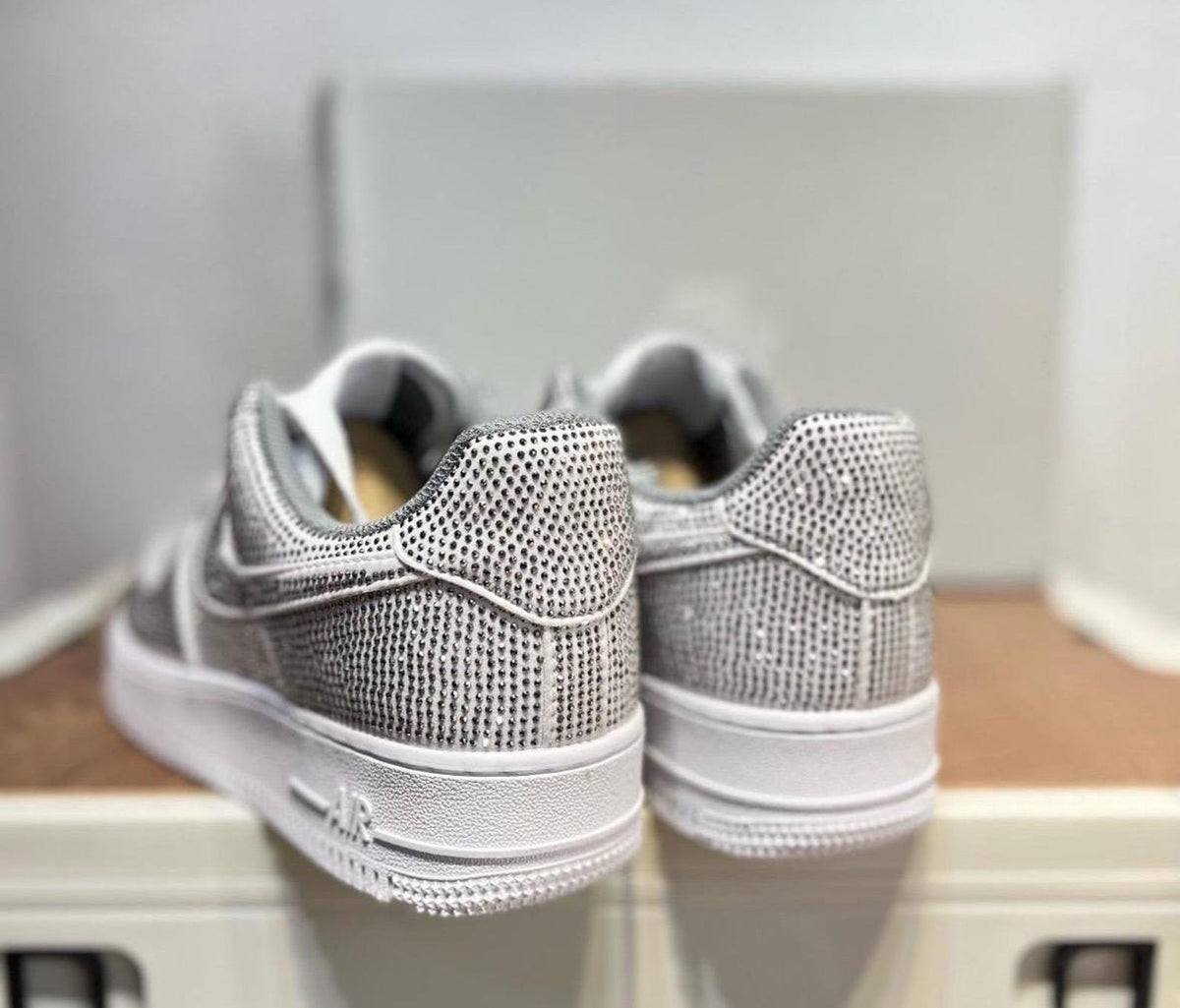 Custom handcrafted silver glitter Air Force 1 sneakers