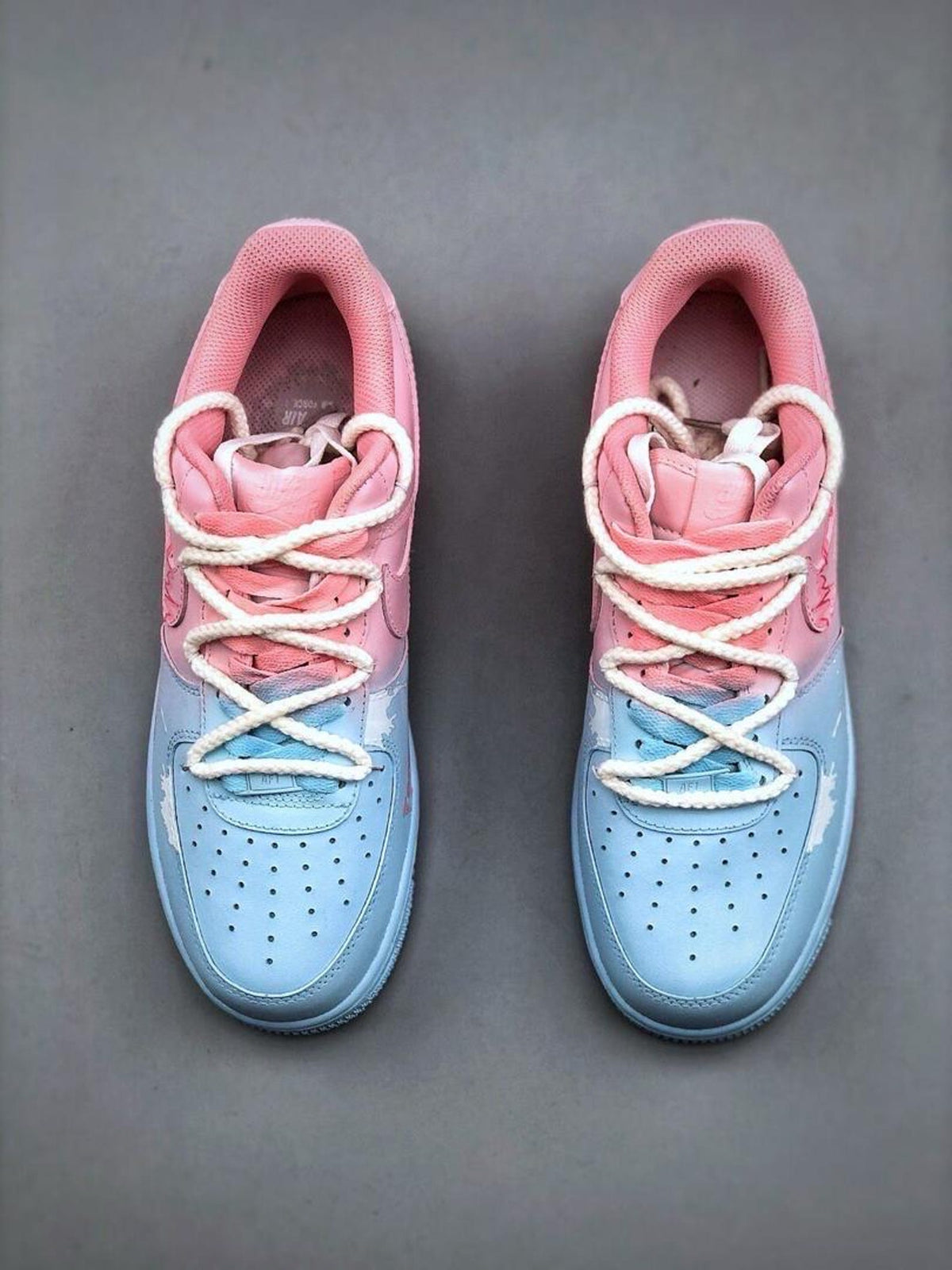 Custom handcrafted pink and blue Air Force 1 sneakers