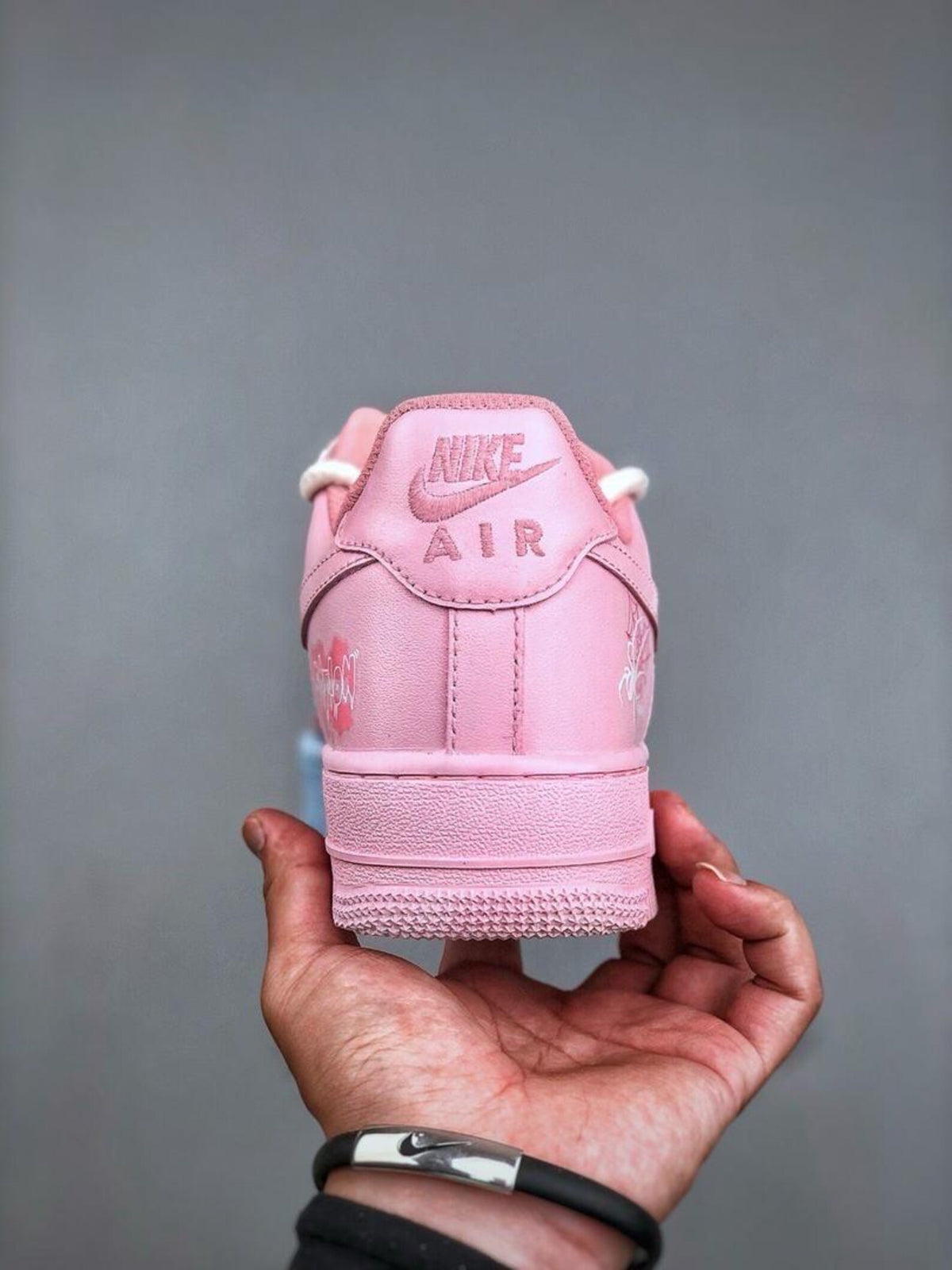 Custom handcrafted pink and blue Air Force 1 sneakers