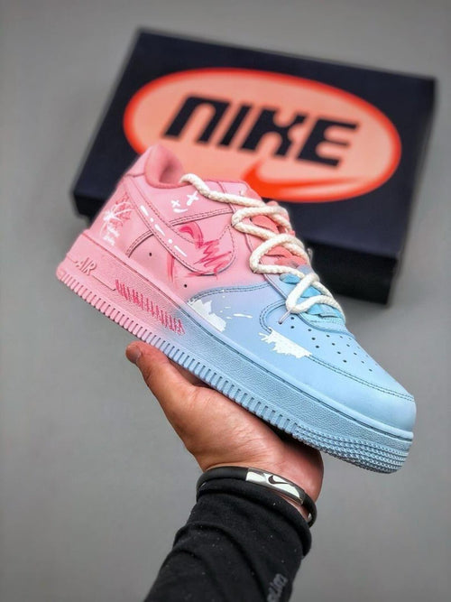 Custom handcrafted pink and blue Air Force 1 sneakers