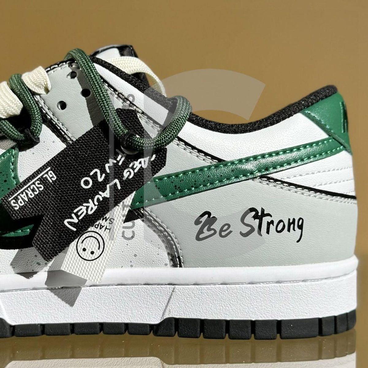Custom Dunk low Black and Green Handpainted Be Strong message with custom extra rope laces for streetwear lovers
