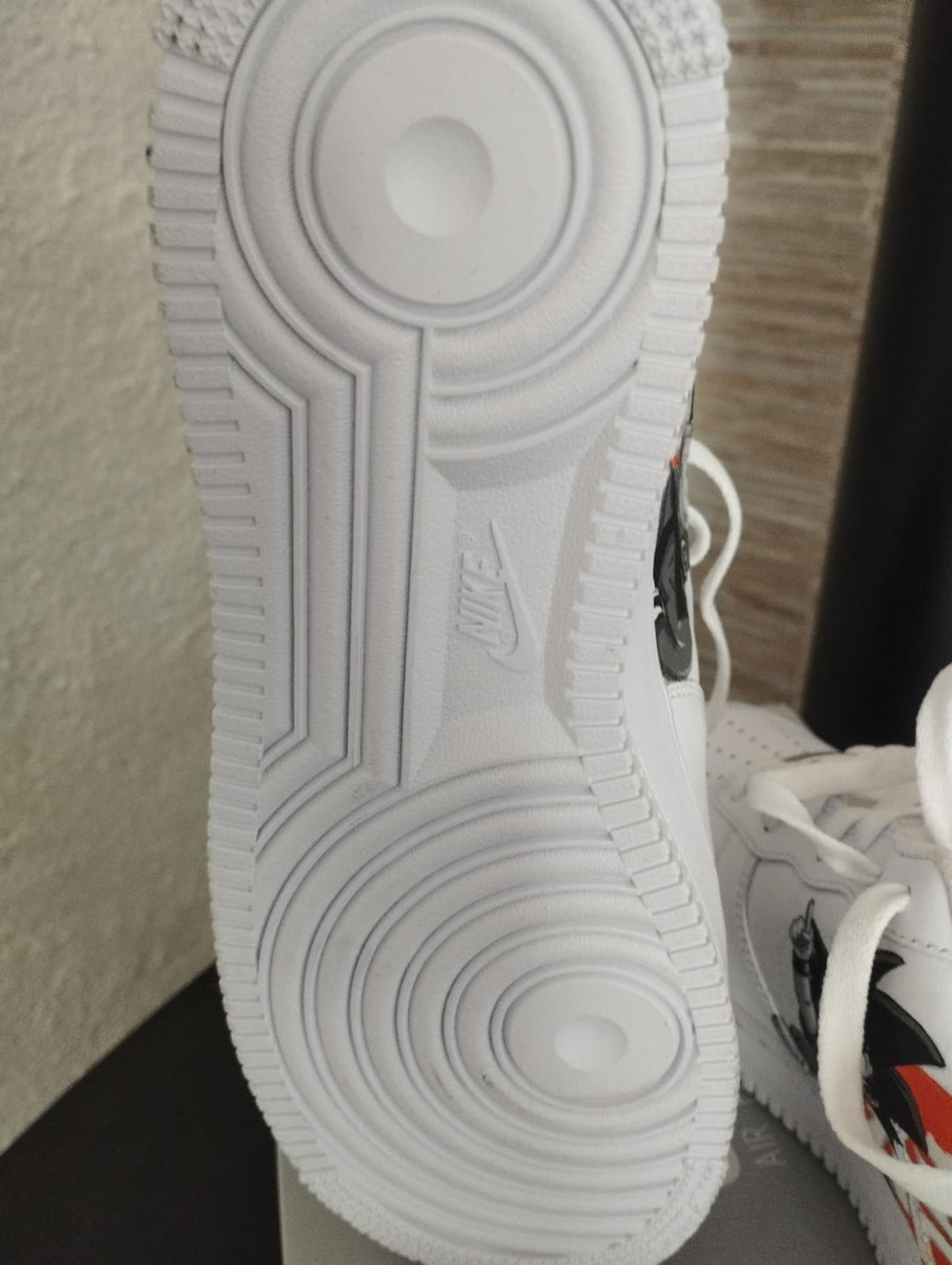 Custom hand-painted Nike Air Force One Dragon Ball sneakers.